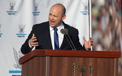 Prime Minister Naftali Bennett speaks at a graduation ceremony for new Israeli Air Force pilots at the Hatzerim airbase in southern Israel, June 24, 2021. (AP Photo/Ariel Schalit)