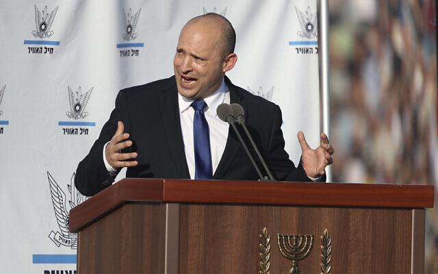 Prime Minister Naftali Bennett speaks at a graduation ceremony for new Israeli Air Force pilots at the Hatzerim airbase in southern Israel, June 24, 2021. (AP Photo/Ariel Schalit) Prime Minister Naftali Bennett speaks at a graduation ceremony for new Israeli Air Force pilots at the Hatzerim airbase in southern Israel, June 24, 2021. (AP Photo/Ariel Schalit)