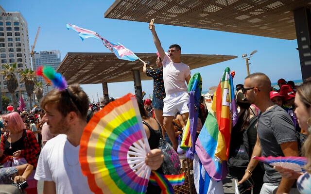 People participate in the annual Gay Pride Parade in Tel Aviv on June 25, 2021. (AP Photo/Ariel Schalit)