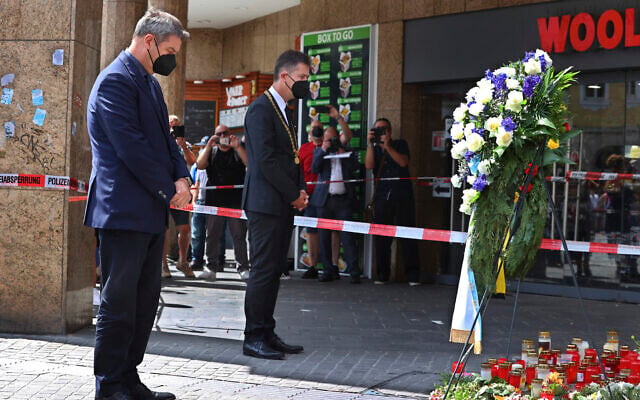 Bavaria's governor Markus Soeder, left, and the mayor of Wuerzburg, Christian Schuchardt, attend a memorial service for the victims of a brutal knife attack that left three women dead, in Wuerzburg, Germany, June 27, 2021. (Karl-Josef Hildenbrand/dpa via AP) Bavaria's governor Markus Soeder, left, and the mayor of Wuerzburg, Christian Schuchardt, attend a memorial service for the victims of a brutal knife attack that left three women dead, in Wuerzburg, Germany, June 27, 2021. (Karl-Josef Hildenbrand/dpa via AP)