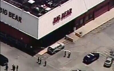 Screen capture from aerial video of police responding to a fatal shooting at a supermarket in Decatur, Georgia, June 14, 2021. (Twitter)