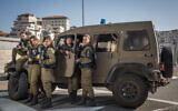 Illustrative: Female soldiers of the Military Police Erez Battalion at a checkpoint near Jerusalem, on December 22, 2015. (Hadas Parush/Flash90)