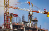 Illustrative: Construction site for a new skyscraper in Jerusalem on April 26, 2021. (Nati Shohat/Flash90)