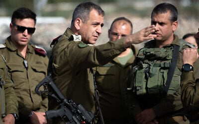 IDF Chief of Staff Lt. Gen. Aviv Kohavi (center)  at the scene of shooting attack in Tapuah Junction, south of the West Bank city of Nablus, on May 3, 2021. (Sraya Diamant/Flash90)