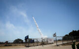 The Iron dome anti-missile system fires an interceptor missile at rockets shot from the Gaza Strip toward Ashkelon, on May 19, 2021. (Olivier Fitoussi/Flash90)