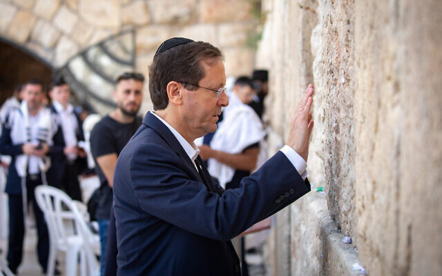 Isaac Herzog prays at the Western Wall in Jerusalem's Old City on June 1, 2021, a day before he was selected by Knesset members as Israel's 11th president. (Olivier Fitoussi/Flash90) Isaac Herzog prays at the Western Wall in Jerusalem's Old City on June 1, 2021, a day before he was selected by Knesset members as Israel's 11th president. (Olivier Fitoussi/Flash90)