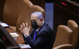 Prime Minister Benjamin Netanyahu sits in the Knesset plenum in Jerusalem, June 2, 2021. (Olivier Fitoussi/Flash90)