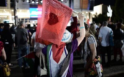 Israelis and Arabs demonstrate in support of coexistence in Tel Aviv on June 5, 2021. (Tomer Neuberg/Flash90)