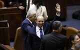 Israel's new Prime Minister Naftali Bennett (C) after the swearing in of the new government, in the Knesset on June 13, 2021. (Olivier Fitoussi/FLASH90)