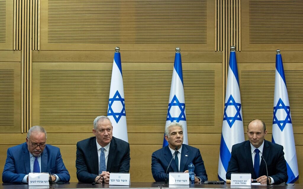 From right, Prime Minister Naftali Bennett, Foreign Minister Yair Lapid, Defense Minister Benny Gantz and Finance Minister Avigdor Liberman attend the first cabinet meeting, at the Knesset on June 13, 2021. (Yonatan Sindel/Flash90) From right, Prime Minister Naftali Bennett, Foreign Minister Yair Lapid, Defense Minister Benny Gantz and Finance Minister Avigdor Liberman attend the first cabinet meeting, at the Knesset on June 13, 2021. (Yonatan Sindel/Flash90)