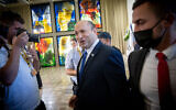Prime Minister Naftali Bennett arrives for a group photo of the new government, at the president's residence in Jerusalem on June 14, 2021. (Yonatan Sindel/FLASH90)