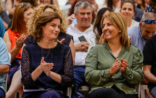 Newly appointed Minister of Environmental Protection Tamar Zandberg (right) with outgoing Minister of Environmental Protection Gila Gamliel (left), during the handover ceremony, held at the Environmental Protection Ministry in Jerusalem on June 15, 2021. (Olivier Fitoussi/Flash90) Newly appointed Minister of Environmental Protection Tamar Zandberg (right) with outgoing Minister of Environmental Protection Gila Gamliel (left), during the handover ceremony, held at the Environmental Protection Ministry in Jerusalem on June 15, 2021. (Olivier Fitoussi/Flash90)