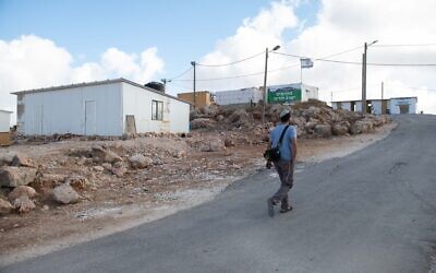 Settlers seen in the Illegal Evyatar outpost, in the northern West Bank, on June 16, 2021. (Sraya Diamant/Flash90)