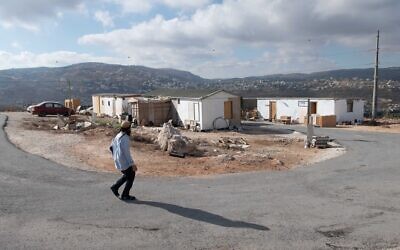 Settlers seen in the Illegal Evyatar outpost, in the northern West Bank, on June 16, 2021. (Sraya Diamant/Flash90)