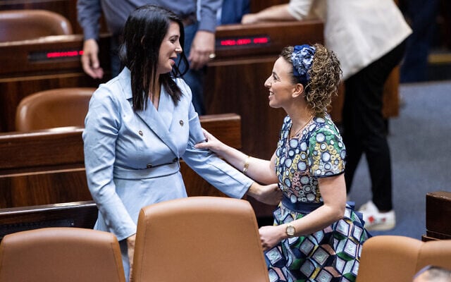 Shirley Pinto, the first deaf Knesset member, with fellow Yamina MK Idit Silman during a swearing-in ceremony of new Israeli parliament members at the Knesset on June 16, 2021. (Yonatan Sindel/Flash90)
