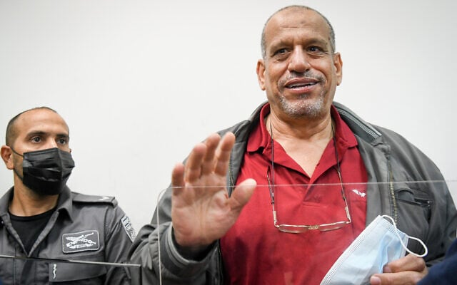 Sheikh Yosef Elbaz, arrested on suspicion of inciting violence, terrorism and making threats, arrives for a hearing at the court in Rishon Lezion, on June 17, 2021. (Flash90) Sheikh Yosef Elbaz, arrested on suspicion of inciting violence, terrorism and making threats, arrives for a hearing at the court in Rishon Lezion, on June 17, 2021. (Flash90)