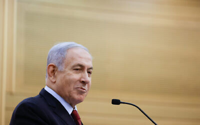 Former prime minister Benjamin Netanyahu and head of the Likud party leads a faction meeting in the Knesset on June 21, 2021. (Olivier Fitoussi/FLASH90P)