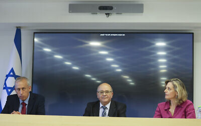 From left to right: National coronavirus czar Nachman Ash, Health Ministry director-general Chezy Levy and Sharon Alroy-Preis, the ministry's head of public health, at a press conference in Jerusalem on June 23, 2021. (Yonatan Sindel/Flash90)