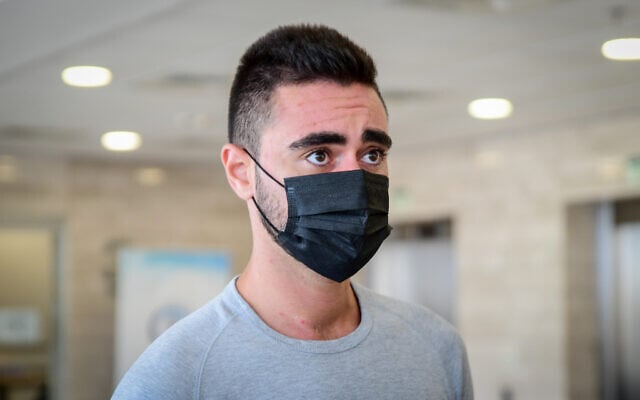 Yonatan Fadida, the driver who killed cyclists Tomer Weinstein and Yaniv Lugasi in 2019, arrives to hear his sentence at the Lod District Court, June 30, 2021. (Avshalom Sassoni/Flash90) Yonatan Fadida, the driver who killed cyclists Tomer Weinstein and Yaniv Lugasi in 2019, arrives to hear his sentence at the Lod District Court, June 30, 2021. (Avshalom Sassoni/Flash90)