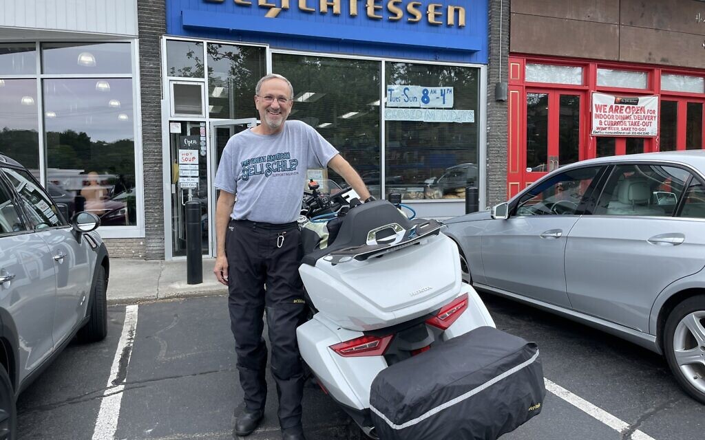 Jewish biker Steve Goode outside Gold's Deli in Westport, Connecticut, part of his 75-day cross-country trek that will see him visit 42 delis to help spread awareness about the problem of food insecurity. (Cathryn J. Prince)