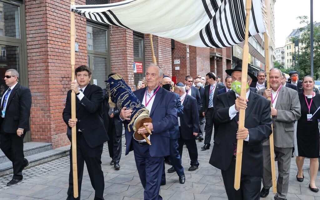 Members of the Budapest Jewish community dance with the Torah at the reopening ceremony of the Rumbach Synagogue, June 10, 2021. (Photo by Akos Szentgyorgyi)