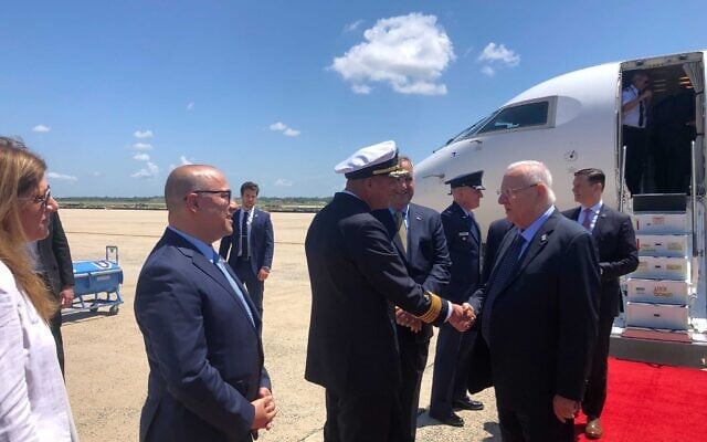 President Reuven Rivlin (R) lands at Joint Base Andrews, Maryland and is greeted by the US State Department’s Chief of Protocol Asel Roberts, June 28, 2021. (Tal Schneider/Times of Israel) President Reuven Rivlin (R) lands at Joint Base Andrews, Maryland and is greeted by the US State Department’s Chief of Protocol Asel Roberts, June 28, 2021. (Tal Schneider/Times of Israel)