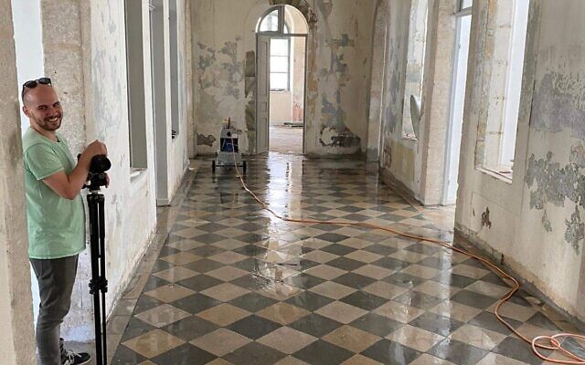 Artist Kobi Vogman in the HaMiffal gallery space, Jerusalem. (Courtesy)