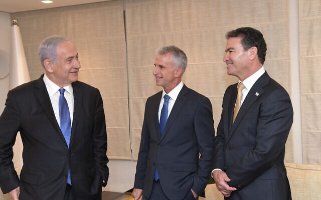 Then Prime Minister Benjamin Netanyahu, left, new Mossad chief David Barnea, center, and Yossi Cohen, at a farewell ceremony for departing Shin Bet chief Cohen, on May 31, 2021. (Kobi Gideon / GPO) Then Prime Minister Benjamin Netanyahu, left, new Mossad chief David Barnea, center, and Yossi Cohen, at a farewell ceremony for departing Shin Bet chief Cohen, on May 31, 2021. (Kobi Gideon / GPO)