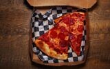 A high school football coach and his staff in Canton, Ohio, are in hot water for disciplining a Jewish student by forcing him to eat a pepperoni pizza. (Amanda Andrade-Rhoades/For The Washington Post via Getty Images, JTA)
