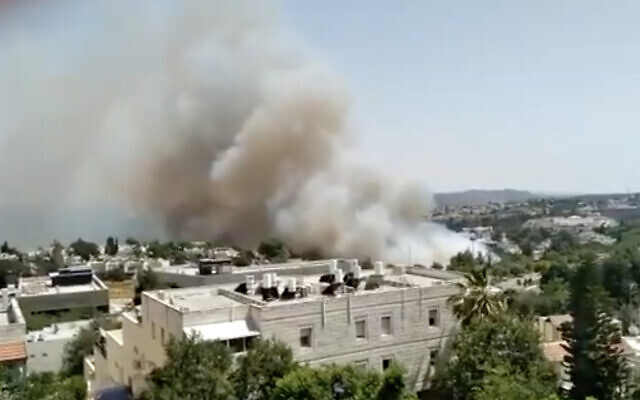 A fire near the Jerusalem suburb of Mevasseret Zion on June 13, 2021. (Screen capture: Twitter)