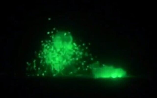 The explosion of a Syrian post along the Israel-Syria border seen through an IDF night sight (Screencapture/Channel 13) The explosion of a Syrian post along the Israel-Syria border seen through an IDF night sight (Screencapture/Channel 13)