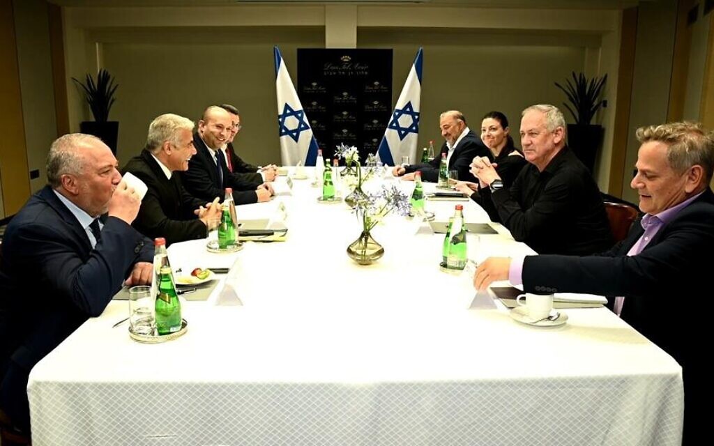 (L-R) Yisrael Beytenu leader Avigdor Liberman, Yesh Atid leader Yair Lapid, Yamina chair Naftali Bennett, New Hope chair Gideon Sa'ar, Blue and White head Benny Gantz, Ra’am chair Mansour Abbas, Labor head Merav Michaeli and Meretz leader Nitzan Horowitz at a meeting of the heads of the would-be-coalition in Tel Aviv, June 6, 2021. (Ra'anan Cohen) (L-R) Yisrael Beytenu leader Avigdor Liberman, Yesh Atid leader Yair Lapid, Yamina chair Naftali Bennett, New Hope chair Gideon Sa'ar, Blue and White head Benny Gantz, Ra’am chair Mansour Abbas, Labor head Merav Michaeli and Meretz leader Nitzan Horowitz at a meeting of the heads of the would-be-coalition in Tel Aviv, June 6, 2021. (Ra'anan Cohen)