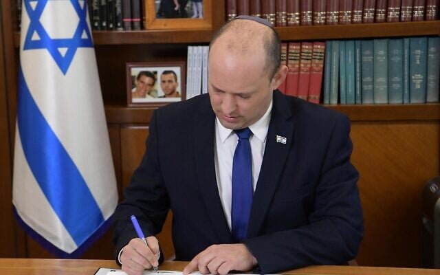 Prime Minister Naftali Bennett at the Prime Minister's Office on the first day of the job in Jerusalem on June 14, 2021. (Amos Ben Gershom/GPO) Prime Minister Naftali Bennett at the Prime Minister's Office on the first day of the job in Jerusalem on June 14, 2021. (Amos Ben Gershom/GPO)