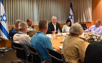 Defense Minister Benny Gantz meets with a delegation from the Jewish Institute for National Security of America at his office in Tel Aviv, June 17, 2021. (Ariel Hermoni/Defense Ministry)