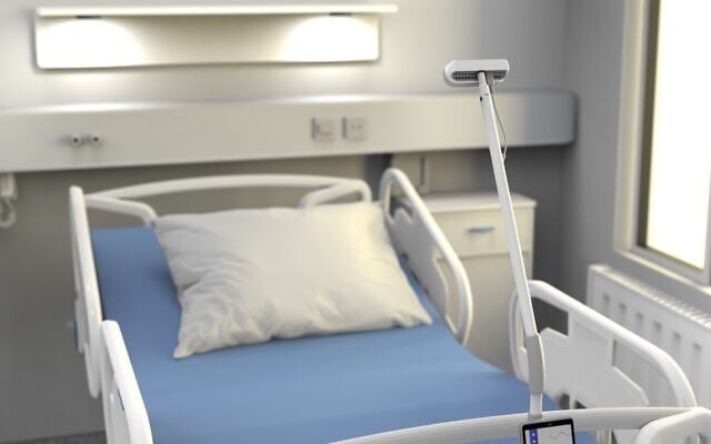Clair Labs has developed a sensor-based device that provides contactless monitoring of patients for their physiological markers by tracking light particles reflected off their skin. The device here is mounted at the side of a hospital bed (Courtesy) Clair Labs has developed a sensor-based device that provides contactless monitoring of patients for their physiological markers by tracking light particles reflected off their skin. The device here is mounted at the side of a hospital bed (Courtesy)