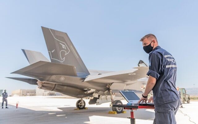 An Israeli technician stands in front of an F-35 fighter jet ahead of an air force exercise in Italy in June 2021. (Israel Defense Forces) An Israeli technician stands in front of an F-35 fighter jet ahead of an air force exercise in Italy in June 2021. (Israel Defense Forces)