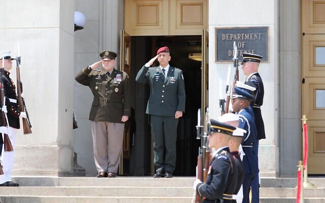 IDF Chief of Staff Aviv Kohavi, center-right, and US Chairman of the Joint Chiefs of Staff Mark Milley, center-left, salute outside the US Department of Defense in Washington, DC, on June 21, 2021. (Israel Defense Forces) IDF Chief of Staff Aviv Kohavi, center-right, and US Chairman of the Joint Chiefs of Staff Mark Milley, center-left, salute outside the US Department of Defense in Washington, DC, on June 21, 2021. (Israel Defense Forces)