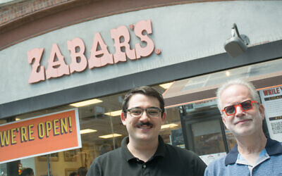 Willie Zabar, left, is the host of a new podcast about his family's business. Zabar's General Manager Scott Goldshine, right, appears on the show. (David Zabar/ via JTA)