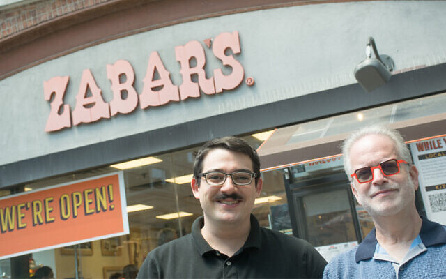 Willie Zabar, left, is the host of a new podcast about his family's business. Zabar's General Manager Scott Goldshine, right, appears on the show. (David Zabar/ via JTA)