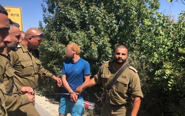 A suspect is arrested after entering Israel from Lebanon. June 7, 2021 (Israel Defense Forces) A suspect is arrested after entering Israel from Lebanon. June 7, 2021 (Israel Defense Forces)