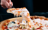 An illustrative image of a pizza (davit85; iStoch by Getty Images)