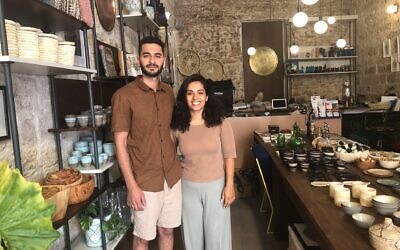 Jack and Adria Abu Shehadeh in Hilweh Market, a carefully curated boutique of handcrafted Palestinian items in Jaffa (Jessica Steinberg/Times of Israel)