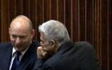 Yamina chief Naftali Bennett and Yesh Atid leader Yair Lapid seen conversing in the plenum on June 2, 2021, hours before Lapid's mandate to form a government expires (video screenshot)