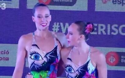 Israeli swimmers Eden Blecher and Shelly Bobritsky catch their breath after their race in Barcelona, Spain, June 13, 2021 (video screenshot)
