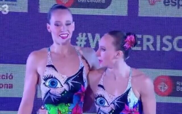 Israeli swimmers Eden Blecher and Shelly Bobritsky catch their breath after their race in Barcelona, Spain, June 13, 2021 (video screenshot) Israeli swimmers Eden Blecher and Shelly Bobritsky catch their breath after their race in Barcelona, Spain, June 13, 2021 (video screenshot)