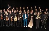 The Jerusalem Orchestra East West will perform 'Waiting for Nissim' with conductor Tom Cohen, and the book's authors, Shira Gefen and Etgar Keret, at the Israel Festival on June 17, 2021 (Courtesy Hayim Yafim Barblet)