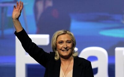National Rally leader Marine Le Pen reacts after being reelected as leader of the far-right Nationally Rally party, at a party congress in Perpignan, southern France, on July 4, 2021. (Valentine Chapuis/AFP) National Rally leader Marine Le Pen reacts after being reelected as leader of the far-right Nationally Rally party, at a party congress in Perpignan, southern France, on July 4, 2021. (Valentine Chapuis/AFP)