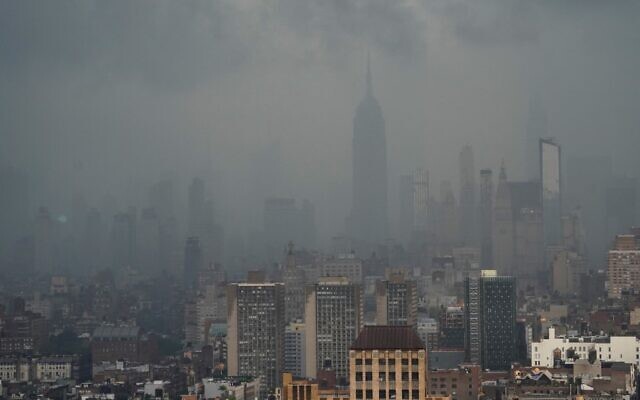 Rain covers the Empire State Building in New York July 8, 2012 as Tropical Storm Elsa moves up the Northeast with heavy rain and flash flood warnings. (TIMOTHY A. CLARY / AFP) Rain covers the Empire State Building in New York July 8, 2012 as Tropical Storm Elsa moves up the Northeast with heavy rain and flash flood warnings. (TIMOTHY A. CLARY / AFP)