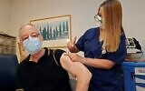 A man receives a third dose of the Pfizer-BioNTech COVID-19 coronavirus vaccine at the outpatient clinics of the Cardiovascular Centre at Sheba Medical Center near Tel Aviv, Israel, on July 12, 2021. (Jack Guez/AFP)