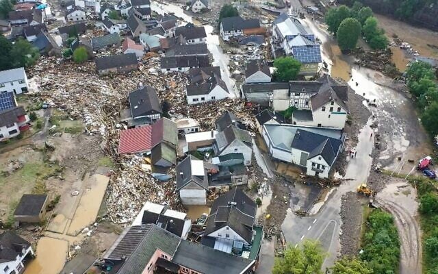 Aerial view taken on July 15, 2021, shows the flooded village of Schuld, near Adenau, western Germany, after heavy rains and floods caused damage and tore down at least six houses, and dozens of people went missing. (Christoph Reichwein / dpa / AFP) Aerial view taken on July 15, 2021, shows the flooded village of Schuld, near Adenau, western Germany, after heavy rains and floods caused damage and tore down at least six houses, and dozens of people went missing. (Christoph Reichwein / dpa / AFP)